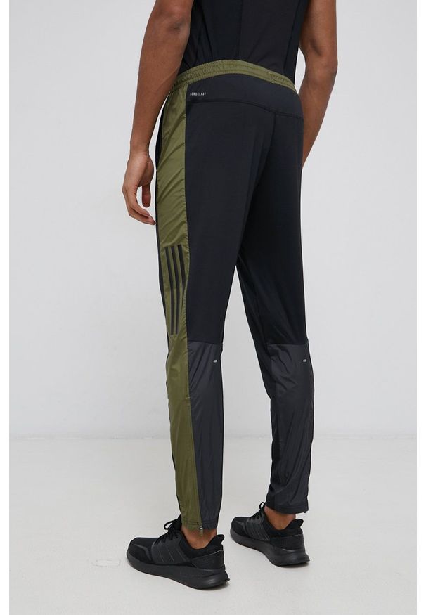 adidas Performance - Adidas Performance Spodnie męskie kolor czarny z aplikacją. Kolor: czarny. Materiał: dzianina, materiał. Wzór: aplikacja