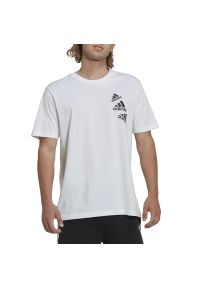 Adidas - Koszulka adidas Essentials BrandLove HL9386 - biała. Kolor: biały. Materiał: bawełna, dresówka, tkanina. Długość rękawa: krótki rękaw. Długość: krótkie. Wzór: aplikacja #1