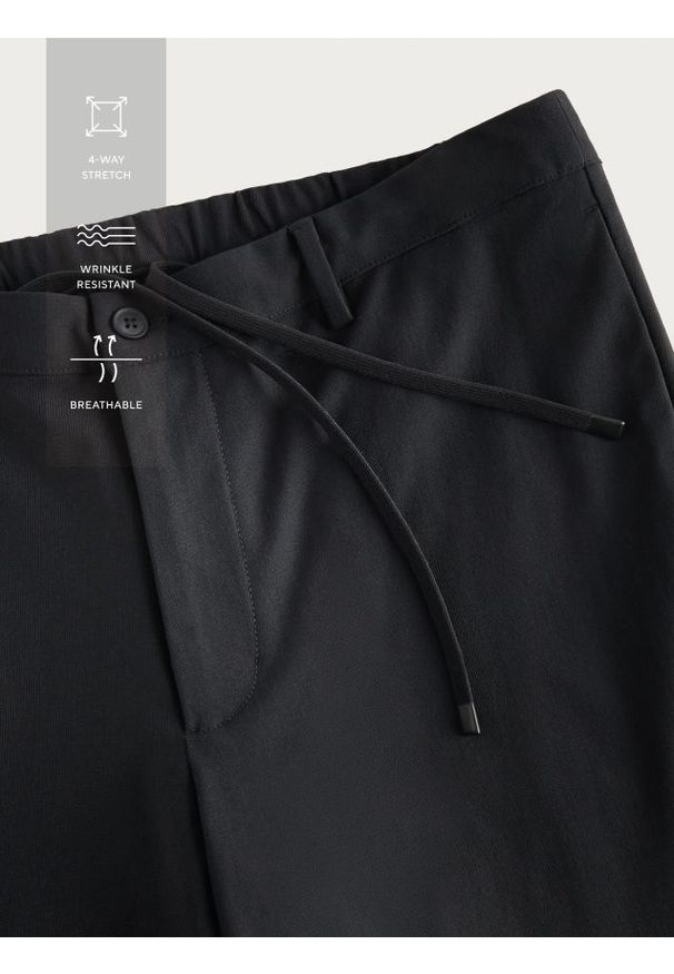 Reserved - Spodnie slim z wiskozą - czarny. Kolor: czarny. Materiał: wiskoza