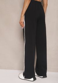 Renee - Czarne Bawełniane Spodnie o Szerokim Kroju High Waist z Lampasami Pillorra. Okazja: na co dzień. Stan: podwyższony. Kolor: czarny. Materiał: bawełna. Styl: sportowy, casual