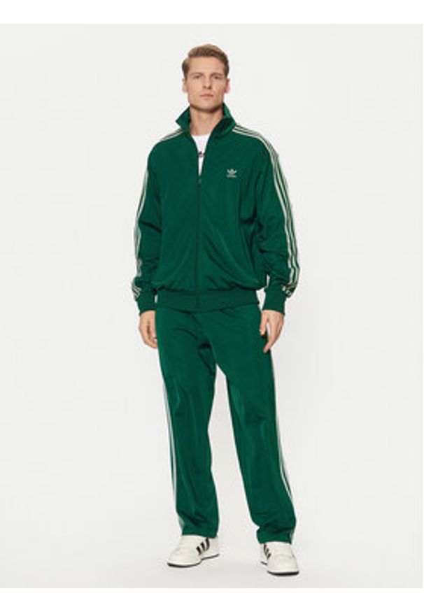 Adidas - adidas Spodnie dresowe adicolor Classics Firebird JP2539 Zielony Regular Fit. Kolor: zielony. Materiał: syntetyk