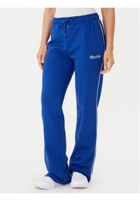 Guess Jeans Spodnie dresowe W5YB32 K68I4 Niebieski Regular Fit. Kolor: niebieski. Materiał: bawełna