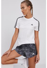 Adidas - adidas T-shirt damski kolor biały. Okazja: na co dzień. Kolor: biały. Wzór: aplikacja. Styl: casual
