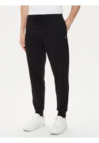 Calvin Klein Jeans Spodnie dresowe Embro J30J326033 Czarny Regular Fit. Kolor: czarny. Materiał: bawełna #1