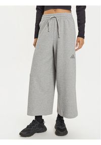 Adidas - adidas Spodnie dresowe ALL SZN IY6830 Szary Wide Leg. Kolor: szary. Materiał: bawełna