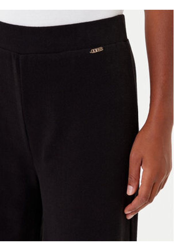 Guess Spodnie dresowe O4BB02 K7611 Czarny Regular Fit. Kolor: czarny. Materiał: bawełna