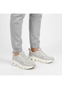Sneakersy damskie Rieker, nowoczesna forma z lekkiej oddychającej cholewki zapewniająca wygodę amortyzowana podeszwa sportowy charakter, szare, W3504. Kolor: szary. Szerokość cholewki: normalna #1