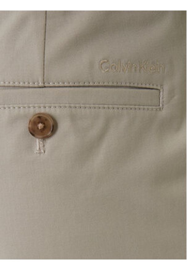Calvin Klein Chinosy LV04LE612G Beżowy Slim Fit. Kolor: beżowy. Materiał: bawełna