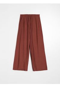 Sinsay - Spodnie wide leg z wiskozą - żółty. Kolor: żółty