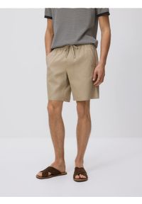 Reserved - Bawełniane szorty jogger - beżowy. Kolor: beżowy. Materiał: bawełna