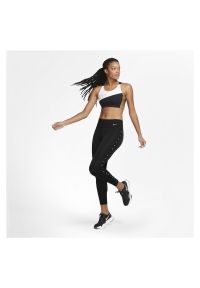 Spodnie treningowe damskie Nike One CU5787. Materiał: materiał, poliester, skóra, tkanina. Technologia: Dri-Fit (Nike). Wzór: gładki, melanż, jednolity. Sport: fitness #2