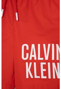 Calvin Klein Jeans szorty kąpielowe dziecięce kolor bordowy. Kolor: czerwony. Materiał: poliester, materiał. Wzór: nadruk #2