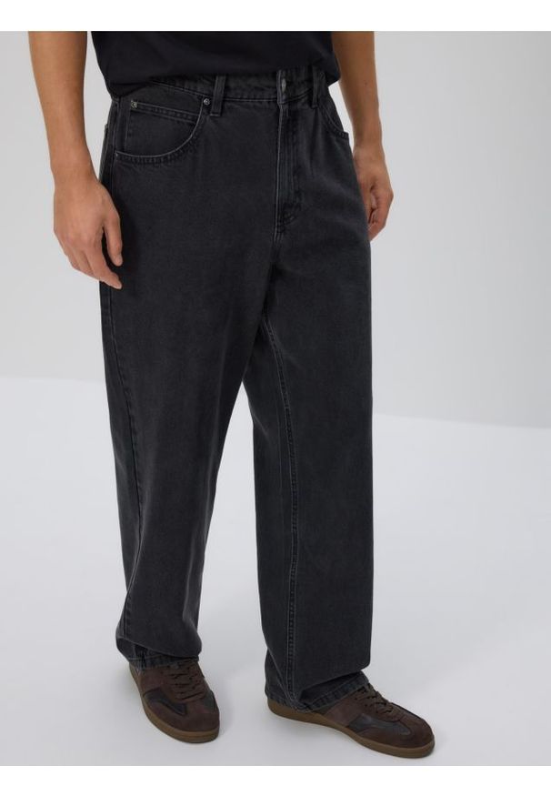 Reserved - Jeansy loose z efektem sprania - czarny. Kolor: czarny