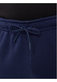 Nike Spodnie dresowe FV7277 410 Granatowy Regular Fit. Kolor: niebieski. Materiał: bawełna #5