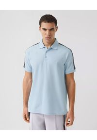 Burberry - BURBERRY - Jasnoniebieska koszulka polo. Okazja: na co dzień. Typ kołnierza: polo. Kolor: niebieski. Materiał: bawełna. Wzór: nadruk. Styl: elegancki, casual #1