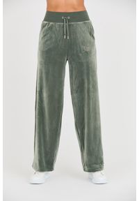 Juicy Couture - JUICY COUTURE Zielone spodnie Bexley Velour Track Pants. Kolor: zielony
