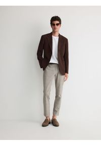 Reserved - Spodnie slim fit - beżowy. Kolor: beżowy. Materiał: wiskoza, tkanina #1