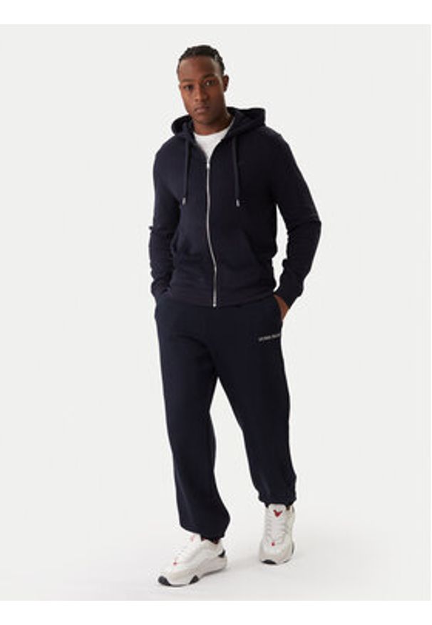 Guess Jeans Spodnie dresowe M6RB70 KCPR1 Granatowy Regular Fit. Kolor: niebieski. Materiał: bawełna