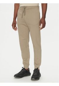 Hugo - HUGO Spodnie dresowe Dayote232 50489617 Brązowy Regular Fit. Kolor: brązowy. Materiał: bawełna #1