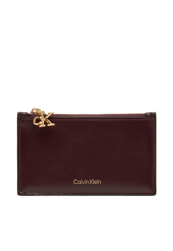 Calvin Klein Etui na karty kredytowe Ck Zip Cardcase 6Cc LV04F1076G Bordowy. Kolor: czerwony. Materiał: skóra