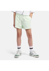 Spodenki dziecięce New Balance LAKG0006MEW – miętowe. Kolor: miętowy. Materiał: bawełna, poliester. Styl: sportowy #1