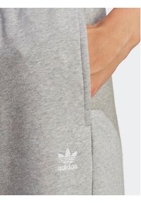 Adidas - adidas Spodnie dresowe Essentials Fleece IA6432 Szary Regular Fit. Kolor: szary. Materiał: bawełna #6