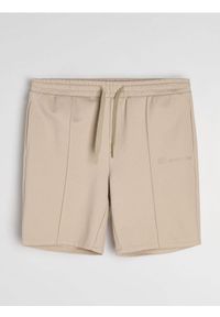 Sinsay - Wiskozowe szorty slim - beżowy. Kolor: beżowy. Materiał: wiskoza #1