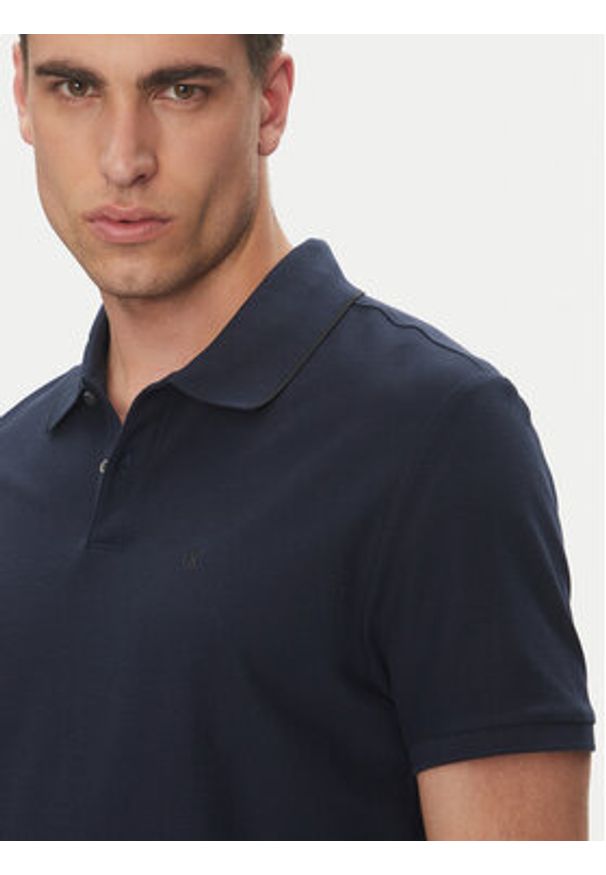 Calvin Klein Polo LV04LC239G Granatowy Regular Fit. Typ kołnierza: polo. Kolor: niebieski. Materiał: bawełna