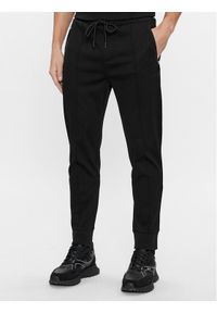 BOSS - Boss Spodnie dresowe Hadiko Mirror 50505320 Czarny Regular Fit. Kolor: czarny. Materiał: dresówka, bawełna