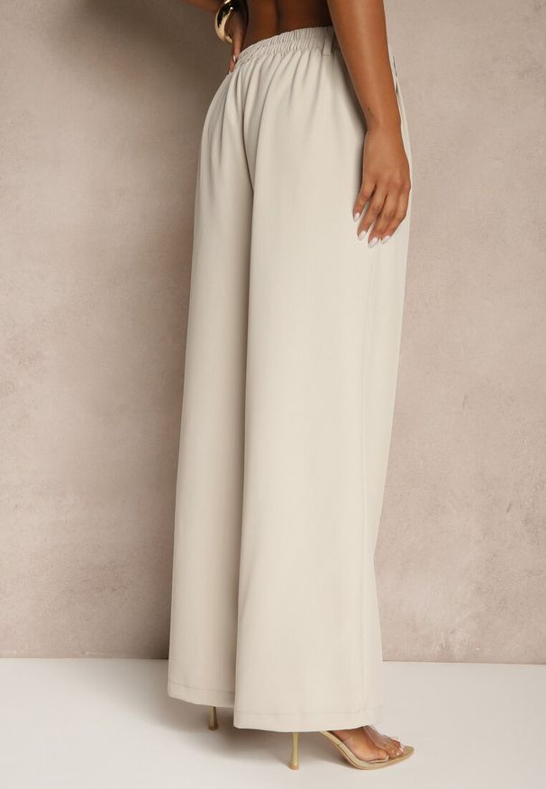 Renee - Jasnobeżowe Spodnie o Szerokim Kroju High Waist Dolarenna. Okazja: na co dzień. Stan: podwyższony. Kolor: beżowy. Styl: elegancki, casual