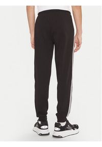 EA7 Emporio Armani Spodnie dresowe 6DPP69 PJ9FZ 1200 Czarny Regular Fit. Kolor: czarny. Materiał: bawełna
