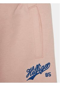 TOMMY HILFIGER - Tommy Hilfiger Spodnie dresowe Hilfiger Script Wide Sweatpant KG0KG07751 Różowy Regular Fit. Kolor: różowy. Materiał: bawełna