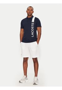 Lacoste Polo DH8940 Granatowy Regular Fit. Typ kołnierza: polo. Kolor: niebieski. Materiał: syntetyk