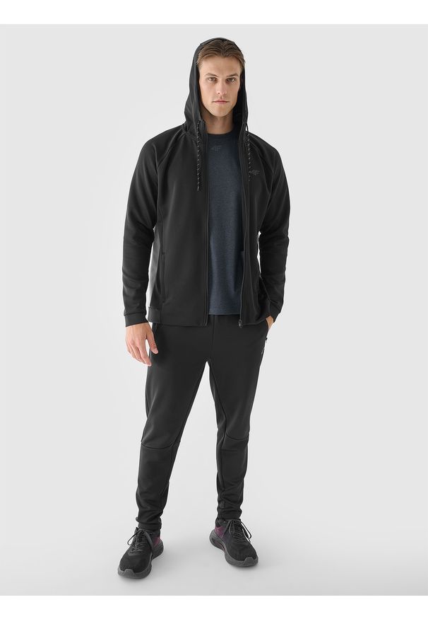 4f - 4F Bluza treningowa rozpinana z kapturem męska - czarna M. Okazja: na co dzień. Typ kołnierza: kaptur. Kolor: czarny. Materiał: dzianina, elastan, włókno, syntetyk, materiał. Długość rękawa: raglanowy rękaw. Wzór: gładki, jednolity, ze splotem. Styl: casual, sportowy
