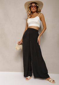 Renee - Czarne Spodnie High Wiast z Wiskozą i Szerokimi Nogawkami Osevia. Okazja: do pracy. Stan: podwyższony. Kolor: czarny. Materiał: wiskoza. Styl: elegancki