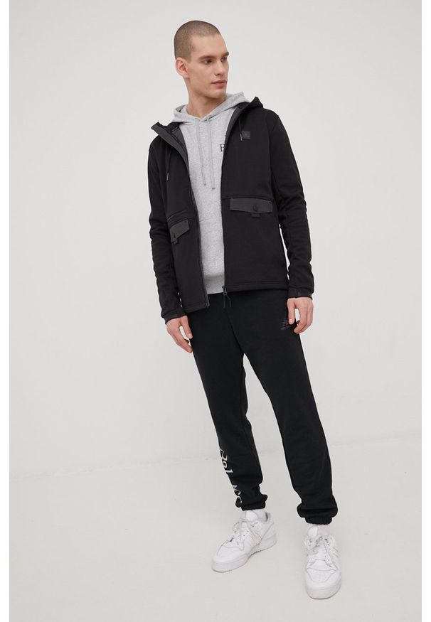 New Balance bluza MT21513AG męska kolor szary z kapturem melanżowa. Typ kołnierza: kaptur. Kolor: szary. Materiał: bawełna. Wzór: melanż