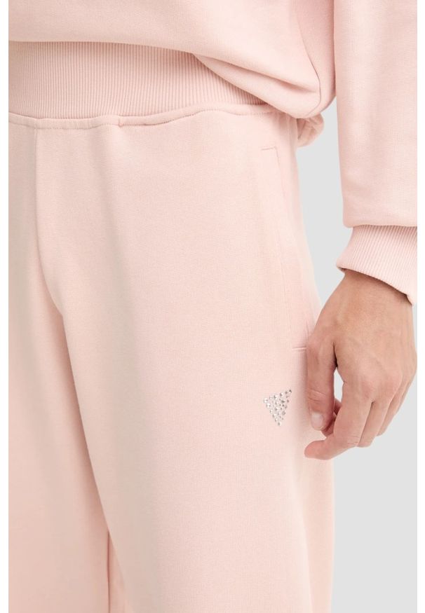Guess - GUESS Różowe dresowe damskie spodnie Primula, Rozmiar S. Kolor: różowy. Materiał: dresówka