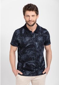 Volcano - Polówka męska z wzorem O-RAW. Typ kołnierza: polo. Kolor: niebieski. Materiał: prążkowany, bawełna, materiał, włókno, dzianina. Wzór: nadruk. Styl: klasyczny #1