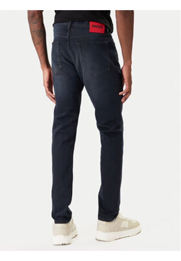 Hugo - HUGO Jeansy 50555175 Granatowy Extra Slim Fit. Kolor: niebieski