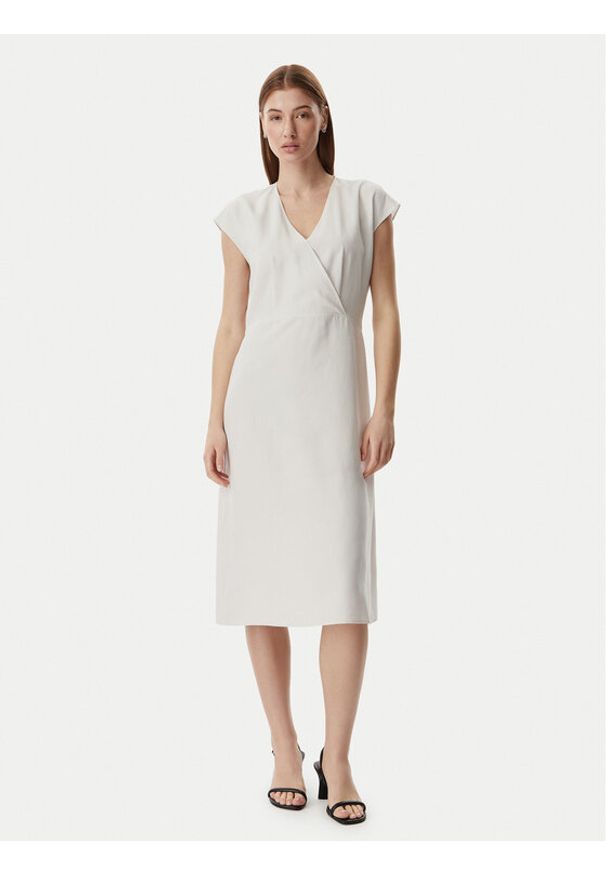 Calvin Klein Sukienka codzienna LV044F016G Beżowy jasny Regular Fit. Okazja: na co dzień. Kolor: beżowy. Materiał: lyocell. Typ sukienki: proste. Styl: casual