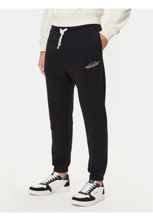Jack & Jones Spodnie dresowe Kane Billy 12283257 Czarny Relaxed Fit. Kolor: czarny. Materiał: bawełna, syntetyk