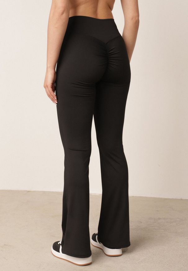 Born2be - Czarne Legginsy o Kroju Dzwonów z Wysokim Stanem i Modelującym Marszczeniem Pronone. Okazja: na co dzień. Stan: podwyższony. Kolor: czarny. Materiał: jeans. Długość: krótkie. Styl: elegancki, casual