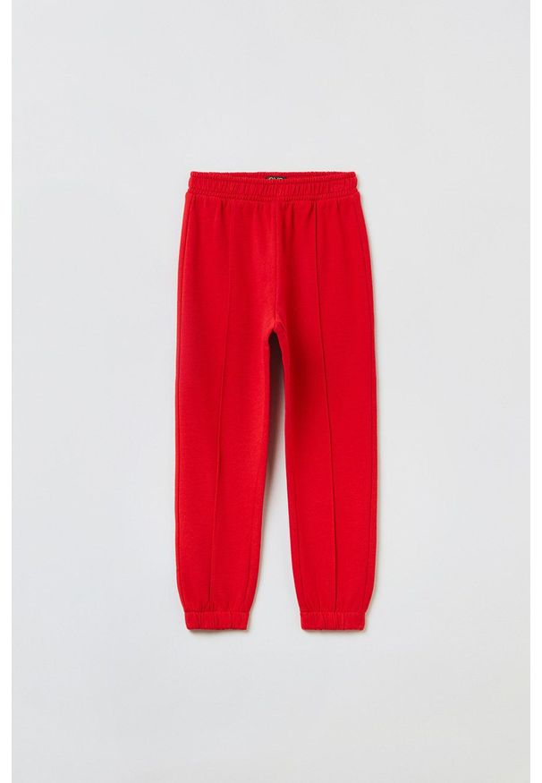 OVS spodnie dresowe dziecięce kolor czerwony gładkie. Okazja: na co dzień. Kolor: czerwony. Materiał: dresówka. Wzór: gładki. Styl: casual