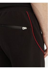 Hugo - HUGO Spodnie dresowe Dusson_RB 50559707 Czarny Relaxed Fit. Kolor: czarny. Materiał: bawełna #5
