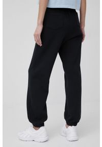 Napapijri spodnie Napapijri X Fiorucci damskie kolor czarny z nadrukiem. Kolor: czarny. Wzór: nadruk #2