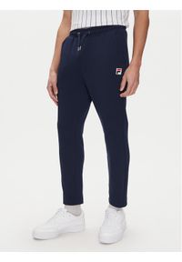 Fila Spodnie dresowe Lobbes FAM0922 Granatowy Tapered Fit. Kolor: niebieski. Materiał: syntetyk #1