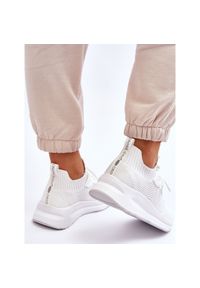 Damskie Wsuwane Sneakersy Cross Jeans LL2R4031C Białe. Okazja: na co dzień. Zapięcie: bez zapięcia. Kolor: biały. Materiał: tkanina, materiał. Szerokość cholewki: normalna