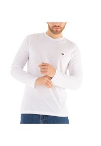 Koszulka Lacoste Longsleeve TH2040-001 - biała. Kolor: biały. Materiał: bawełna. Długość rękawa: długi rękaw. Długość: długie. Sezon: wiosna, zima