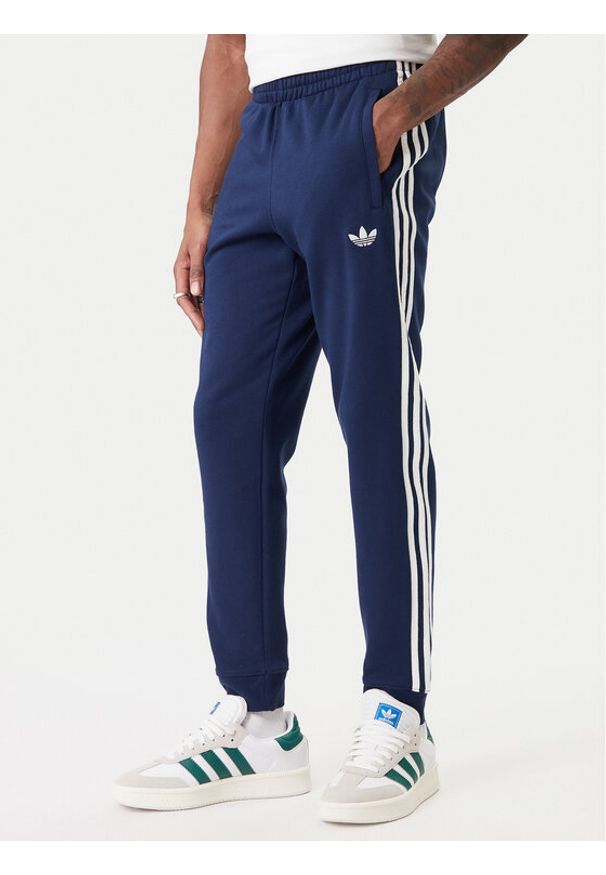 Adidas - adidas Spodnie dresowe 3-Stripes KE3561 Granatowy Slim Fit. Kolor: niebieski. Materiał: syntetyk, bawełna