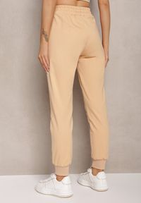 Renee - Jasnożółte Dresowe Spodnie Bawełniane Joggery z Kieszeniami na Suwaki Bieitta. Kolor: żółty. Materiał: bawełna, dresówka